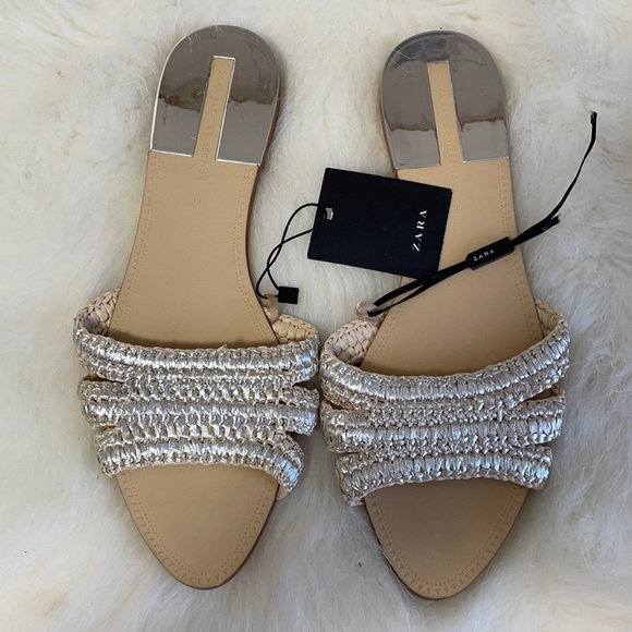 New with tags Zara silver raffia sandals.